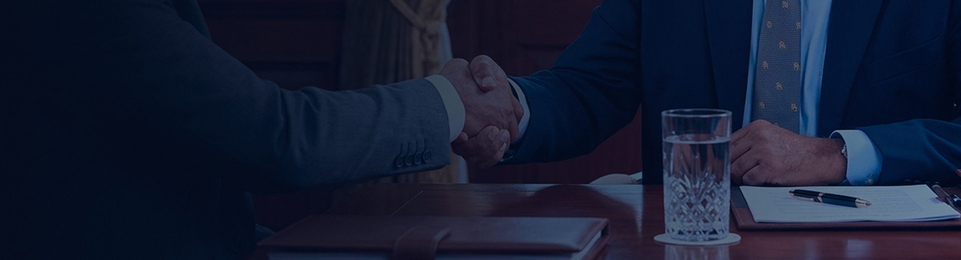 Business professionals handshake